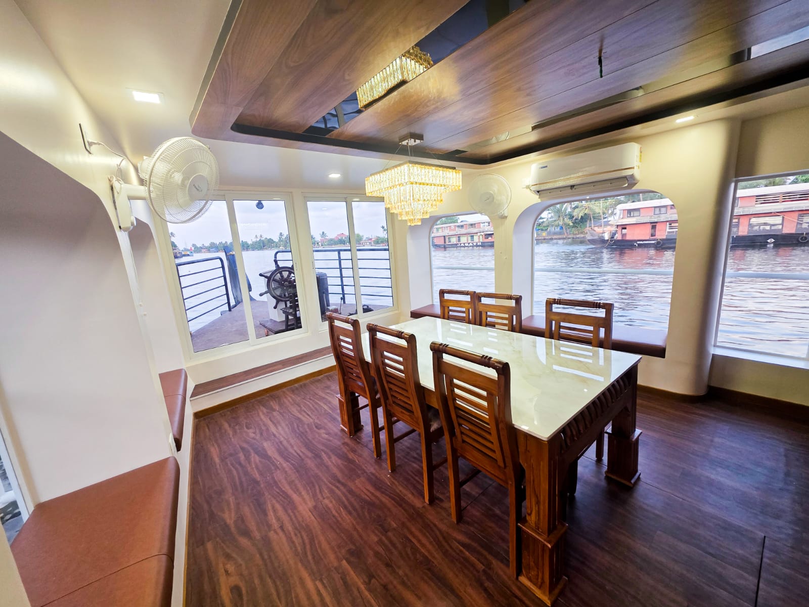 Houseboat cruising peacefully through Vembanad Lake