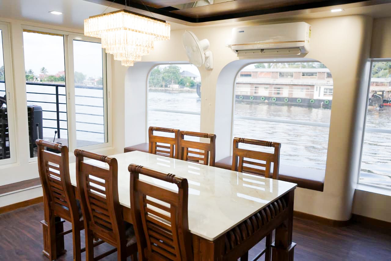 Authentic Kerala cuisine and seafood served during houseboat cruise
